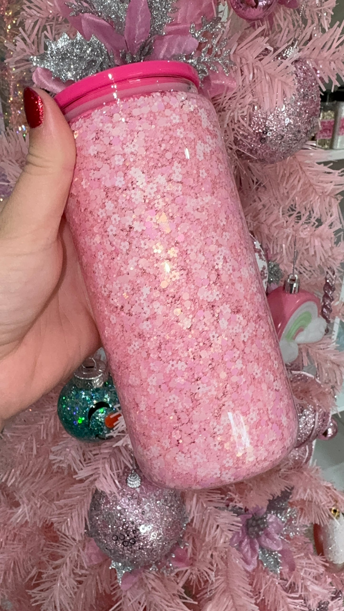 Pink glass snow globe with flowers